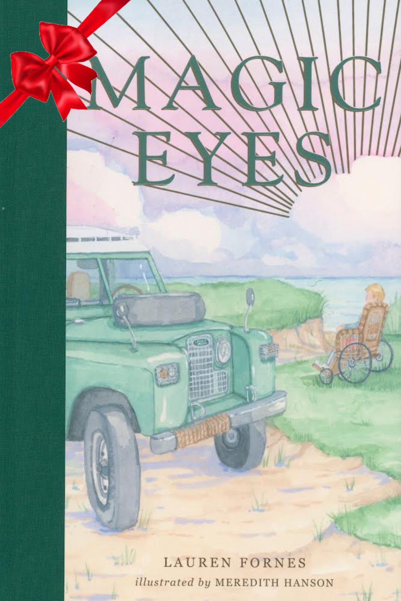Image of the cover of Magic Eyes, a children's book about a blind boy on Nantucket. The cover art includes a boy in a wheelchair and a vintage Land Rover on a small cliff overlooking the Atlantic Ocean. The cover includes the names of author (Lauren Fornes) and illustrator (Meredith Hanson). This image also includes a red bow in the upper left corner, as this product is a donation to local school libraries.
